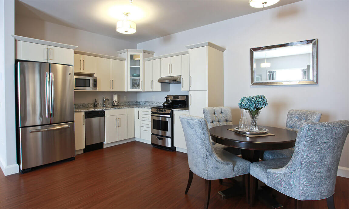 Resident suite kitchen and dining room at Parkland at the Lakes, in Dartmouth, Nova Scotia