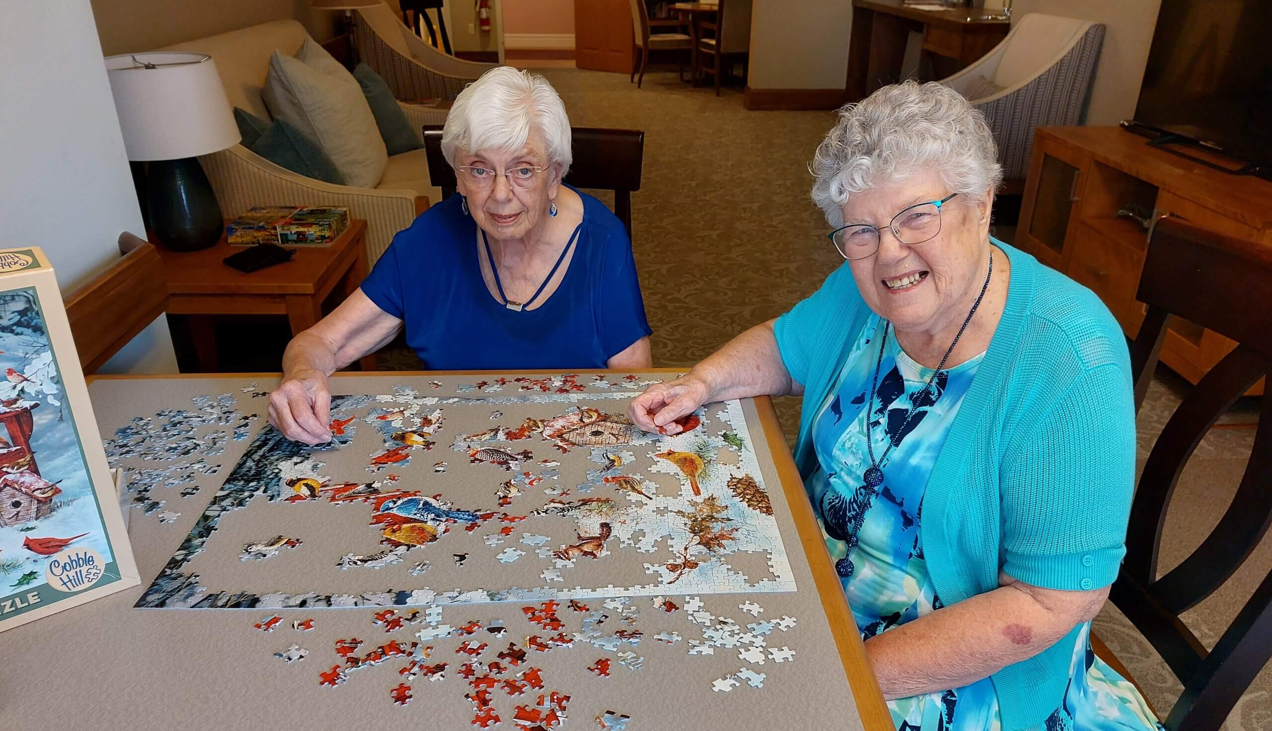Residents putting a puzzle together