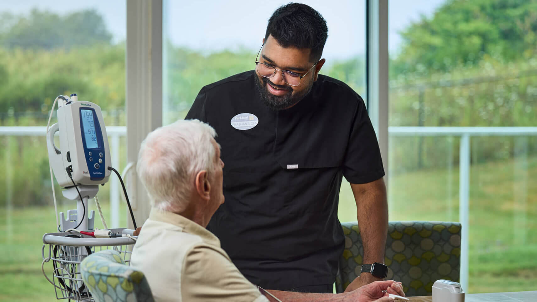 Nurse attending to a resident.